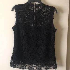 Black lace top in great condition, I wore it 1 time.